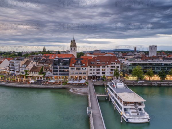 View from the Moleturm to the harbour of Friedrichshafen, ships, cloudy atmosphere at sunset, Lake