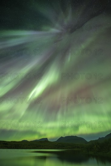Northern Lights over the mountains of Lapporten, Abisko National Park, Lapland, Sweden, Europe