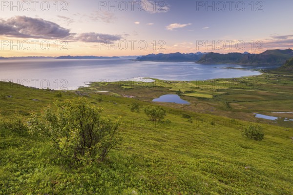 View of the coast and mountains from Mount Hoven, Gimsoy, Lofoten, Norway, Europe