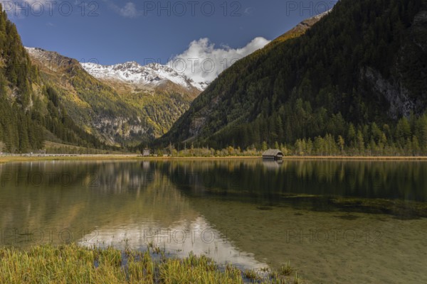 Boatshelter at Lake Stappitz in first morning light, Seebach valley, Mallnitz, Carinthia, Austria,