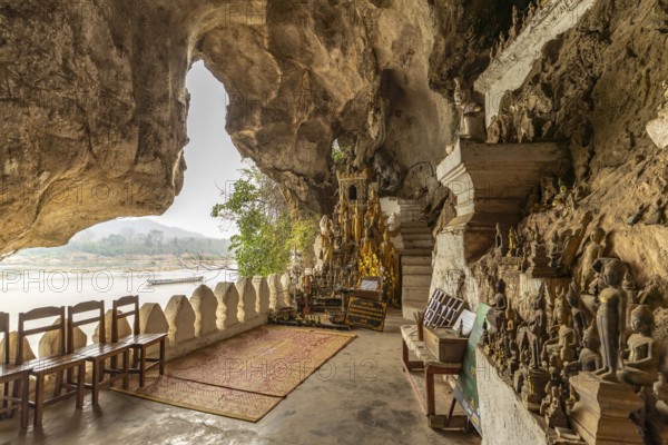 Buddha statues in the Pak Ou caves near Luang Prabang, Laos, Asia