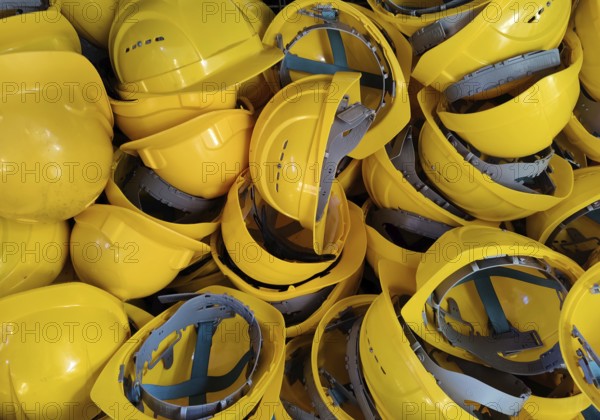 Yellow safety helmets for visitors to adjust, Rammelsberg Ore Mine, UNESCO World Heritage Site,