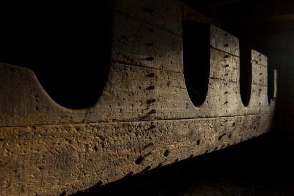 Play of light on raw wooden surface in gloomy surroundings, Neukirchen am Großvenediger, Salzburg,