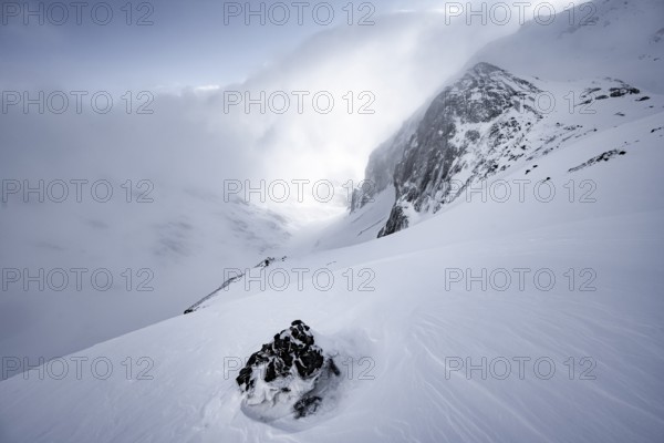 Snow-covered mountain landscape, ascent to the Wildhorn, cloudy mood, high tour, Bernese Alps,