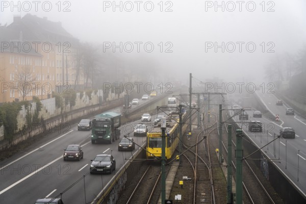 Dense fog, with visibility sometimes less than 100 metres, A40 motorway, city passage in Essen,