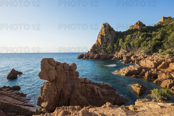 Red rocks and sea, Spiaggia Su Sirboni, sunrise, near Tertenia, Province of Ogliastra, Sardinia,