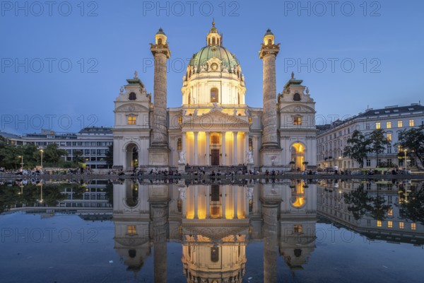 The baroque Karlskirche church at dusk, Vienna, Austria, Europe