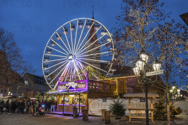 Ferris wheel at the winter village, Christmas market at dusk, Jakobsplatz, Nuremberg, Middle