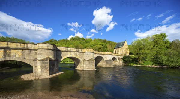 Old stone bridge from 1223 over the river Werra with bridge chapel, Liboriuskapelle, pilgrimage