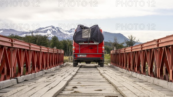 4x4 campervan crossing a bridge near Estancia Harberton, Tierra del Fuego Province, Argentina,
