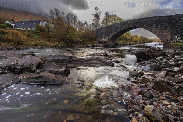 Wild river, rapids, stone bridge, old, houses, autumn, clouds, Bridge of Orchy, Scottish Highlands,
