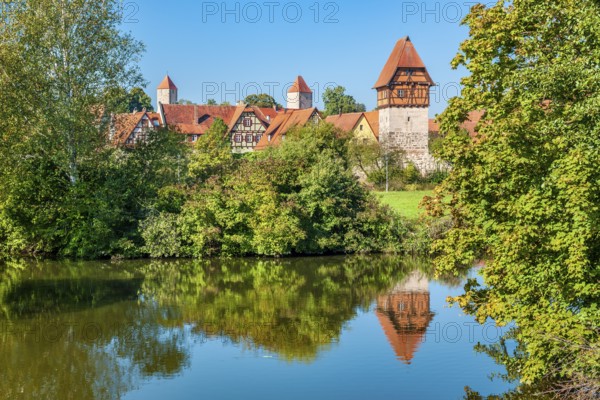 View of the old town with half-timbered houses, towers and town wall, on the right the