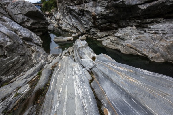 Rocks, granite rock formations in the Maggia River near Ponte Brolla, in the Maggia Valley, Valle