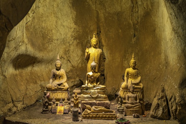 Buddha statues in the Pak Ou caves near Luang Prabang, Laos, Asia