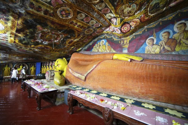 Reclining Buddha in Aluvihara Rock Cave Temple or Cave Monastery, Aluvihara, Matale, Central