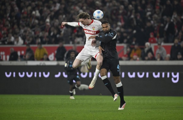 Header duel duel action Nick Woltemade VfB Stuttgart (11) against Jonathan Tah Bayer 04 Leverkusen