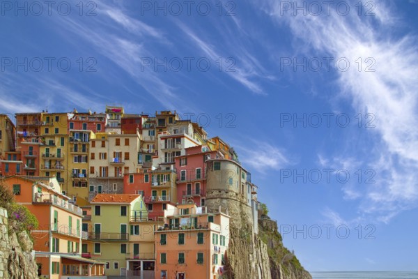 Cinque Terre, Italy, Scenic view of Vernazza shoreline and colorful buildings in a bay, Europe