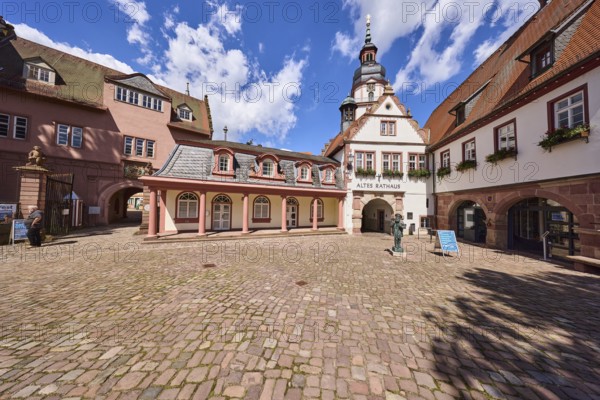 Old town hall, church tower, Erbach town church, historical buildings, blue sky with cumulus
