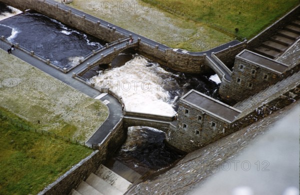 Water outflow from the sluice gates of Claerwen Reservoir, Elan Valley, Powys, Wales, United