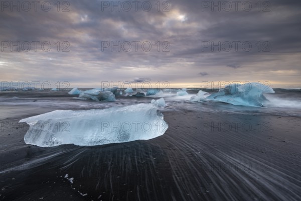 Diamond Beach, icebergs on the black lava beach, near Jökulsarlon glacier lagoon, Vatnajökull