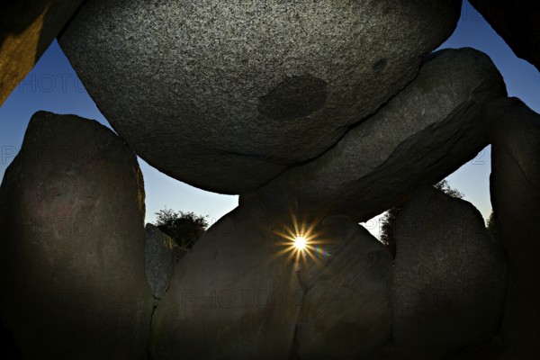 Sunset in the Sprove dolmen, sunlight falling through the stone blocks, Sprove, Møn Island,