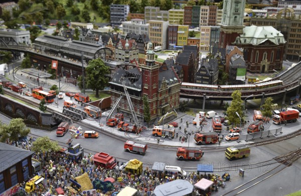 Fire brigade extinguishes burning house at Miniatur Wunderland Hamburg, Germany, Europe