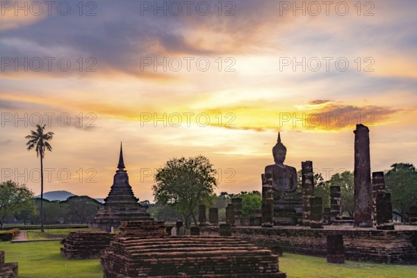 The central Buddhist temple Wat Mahathat at sunset, UNESCO World Heritage Sukhothai Historical