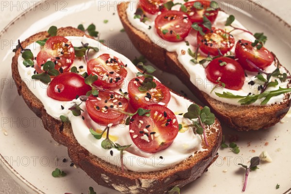 Sandwiches with cream cheese and cherry tomatoes, breakfast, homemade