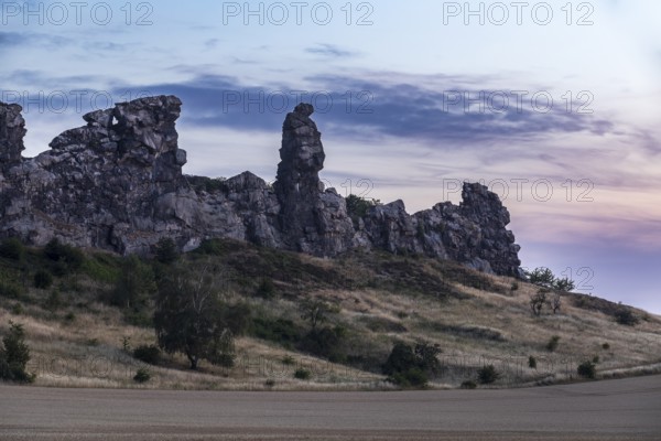 Devil's Wall with Königsstein stone formation in the last evening light, Weddersleben, Thale, Harz,