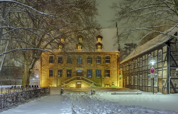 Landsbergschen Hof public library winter snow illuminated Stadthagen Germany