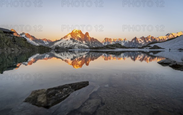 Evening mood, mountain landscape at sunset, alpenglow, water reflection in Lac Blanc, mountain