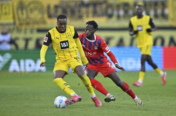 Duel, action Jamie Bynoe-Gittens Borussia Dortmund BVB (43) against Omar Haktab Traore 1. FC