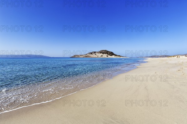 Crystal clear turquoise water, deserted dream beach in spring, Simos beach, Sarakiniko beach,
