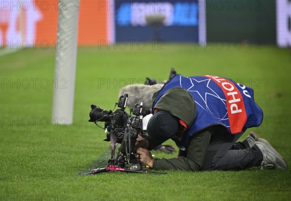 Sports photographer adjusts his backdoor camera, Champions League, MHPArena, MHP Arena Stuttgart,