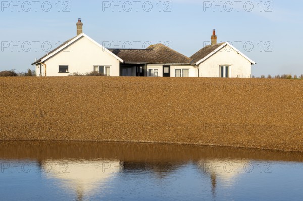 The Beacons bungalow house on beach at Shingle Street, Hollesley Bay, Suffolk, England, UK