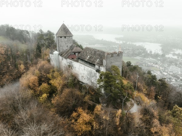 Aerial view of Hohenklingen Castle above Stein am Rhein on a foggy autumn day, Canton Schaffhausen,