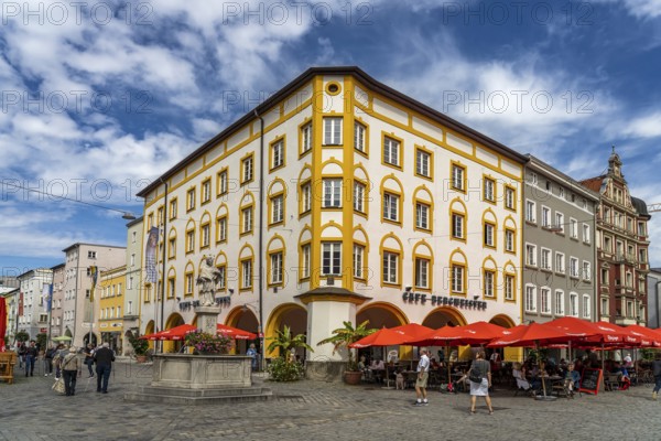 Max-Josefs-Platz with the Nepomuk Fountain and Cafe Bergmeister in Rosenheim, Bavaria, Germany,