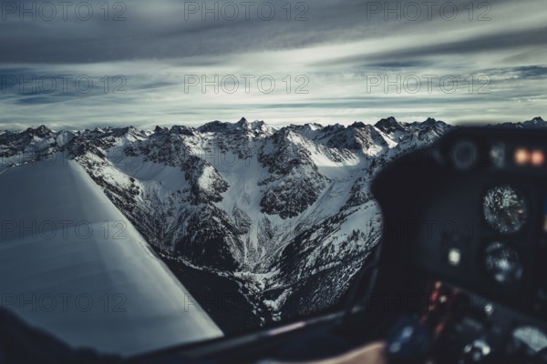 Flight over the late winter Lech Valley with a small aeroplane in Tyrol, Austria, Europe