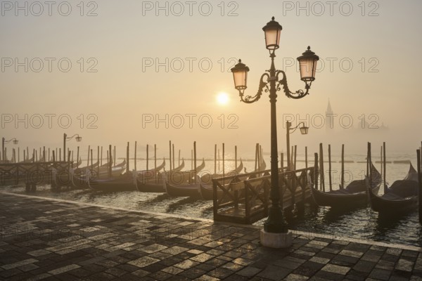 View from 'Colonna di San Marco e San Teodoro' on a latern and the gondolas lying in the water with