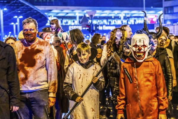 The Zombiewalk in Essen, on Halloween several hundred people, some dressed as scary zombies,