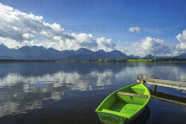 Green rowing boat, Hopfensee, Hopfen am See, near Füssen, Ostallgäu, Allgäu, Bavaria, Germany,