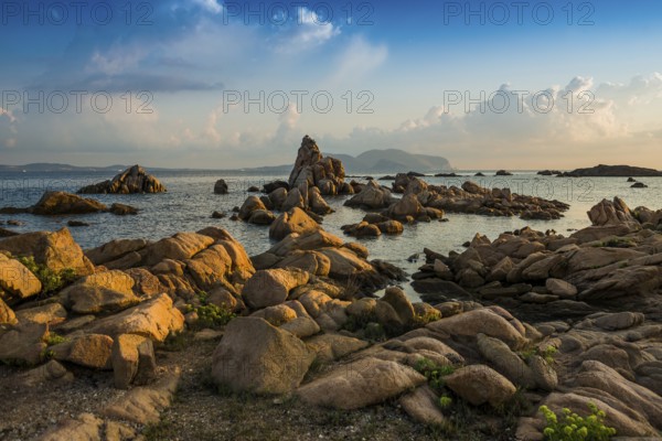 Lonely beach with granite rocks, sunrise, Spiaggia Poltu Manzu, Capo Ceraso, near Olbia, Sardinia,