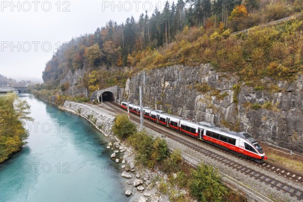 Train of the S-Bahn Vorarlberg of the Austrian Federal Railways ÖBB Eisenbahn Nahverkehr in autumn