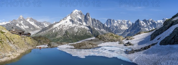 Mountain landscape with mountain lake Lac Blanc, mountain peaks, Aiguille Verte, Grandes Jorasses,