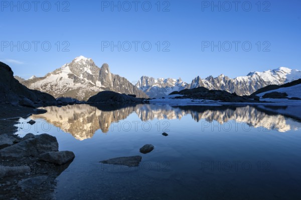 Mountain landscape in the evening light, water reflection in Lac Blanc, mountain peak, Aiguille