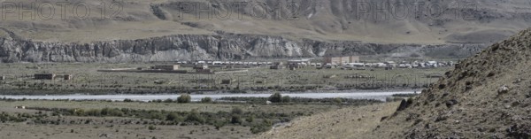 Town view, Engilchek river with village, ghost town, Engilchek, Tian Shan, Kyrgyzstan, Asia