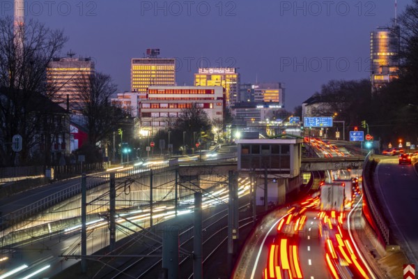 Motorway A40, Ruhr expressway, heavy traffic jam, rush hour, city passage in Essen, skyline of the
