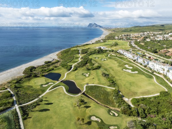 The La Hacienda Links Golf Resort at the Mediterranean Sea with the Rock of Gibraltar (British) in