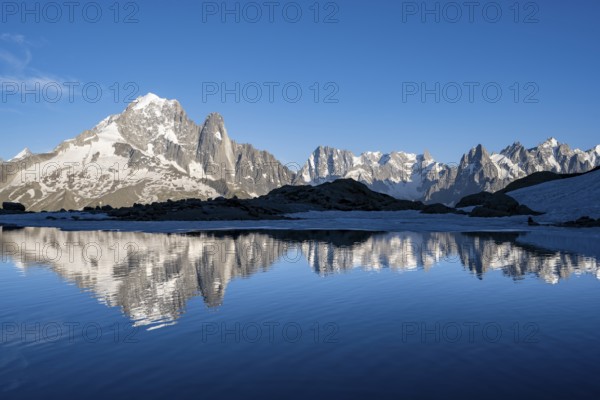 Mountain landscape in the evening light, water reflection in Lac Blanc, mountain peak, Aiguille