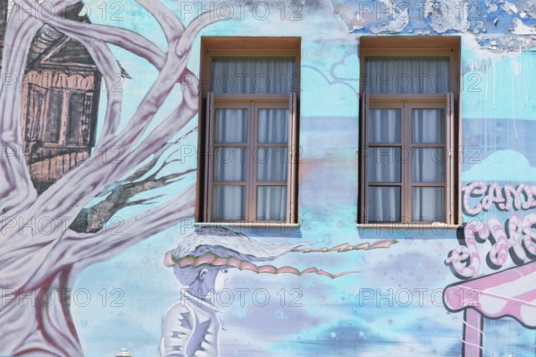Old house painted with murals, Petychakis square, Rethymno, Crete, Greek Islands, Greece, Europe